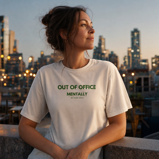 Out of Office tee worn on a city rooftop at dusk