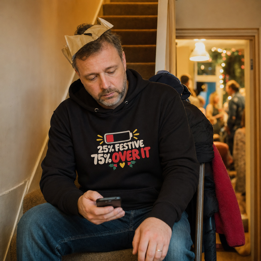 25% Festive, 75% Over It hoodie worn while hiding on the stairs at a family Christmas party