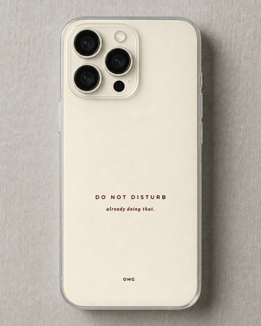 Clear iPhone case printed “Do Not Disturb, already doing that” in dark rose lettering