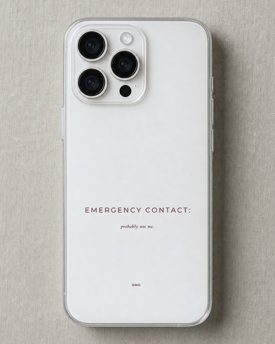 Clear iPhone case printed “Emergency contact: probably not me” in dark rose lettering